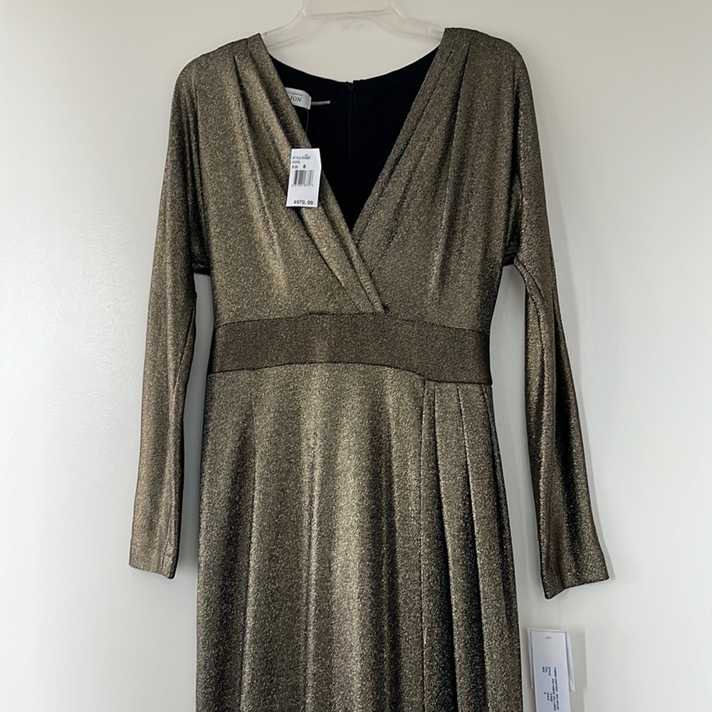 Worn once elegant dress with a slit!